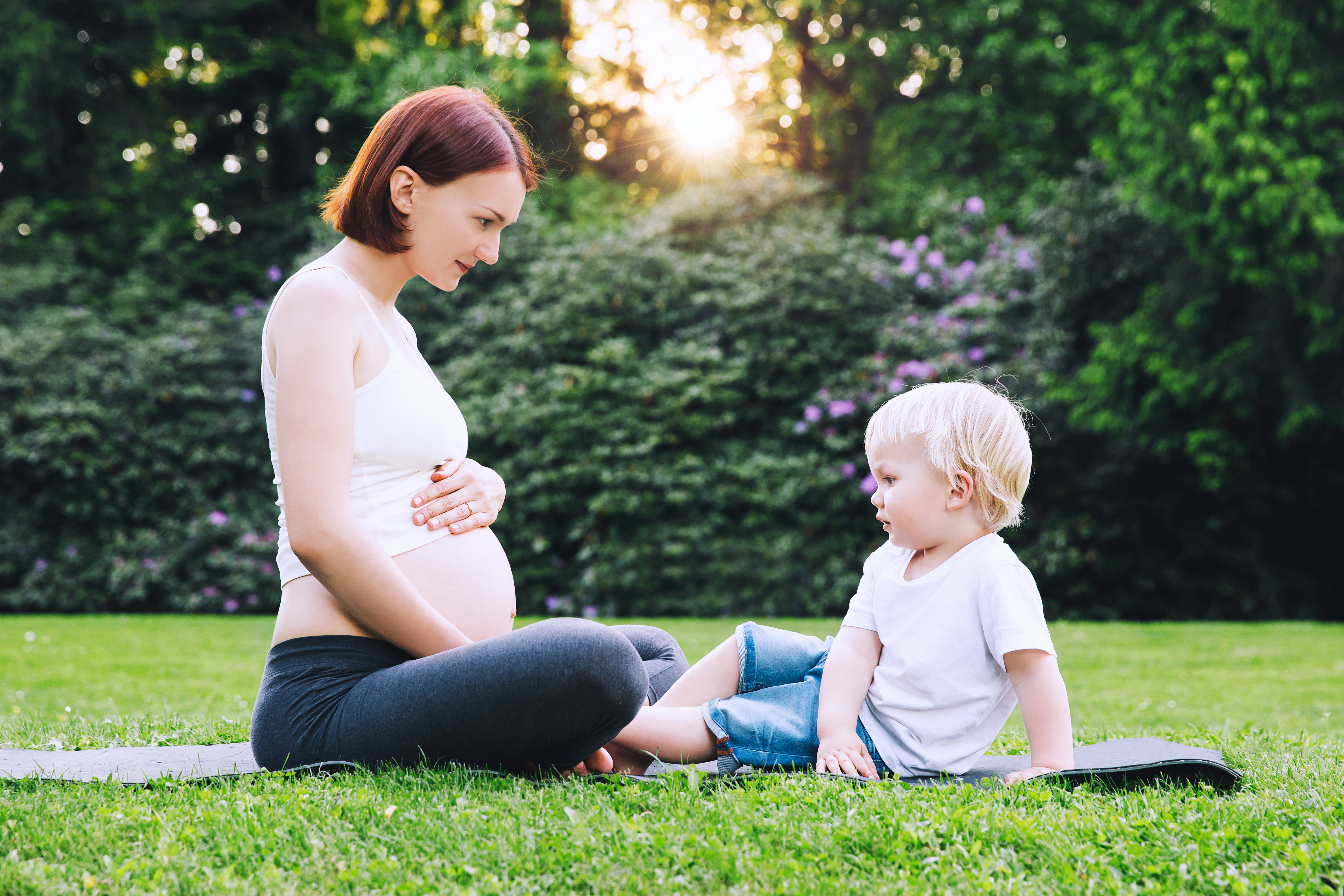Pregnant Mother Talking to Her Son